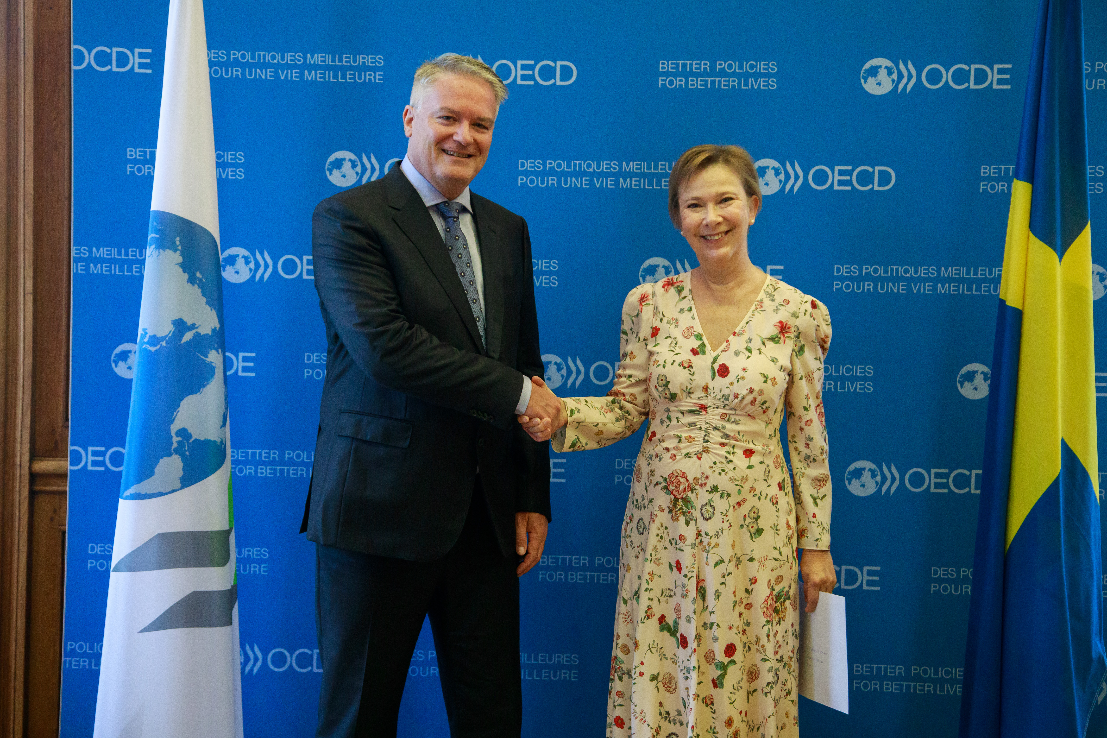 OECD:s generalsekreterare Mathias Cormann och ambassadör Helena Sångeland